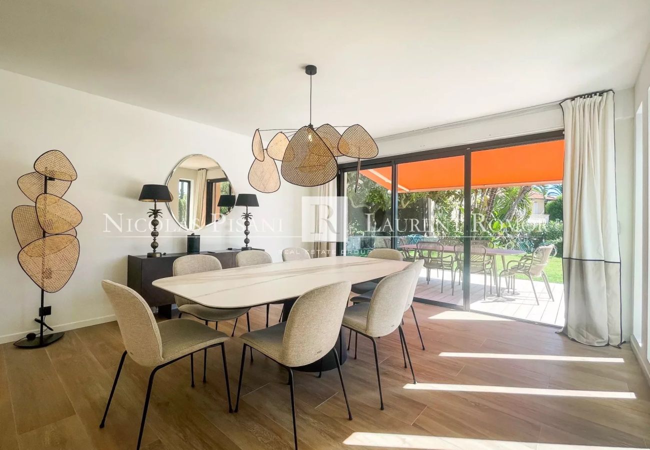 Dining room opening onto terrace and garden